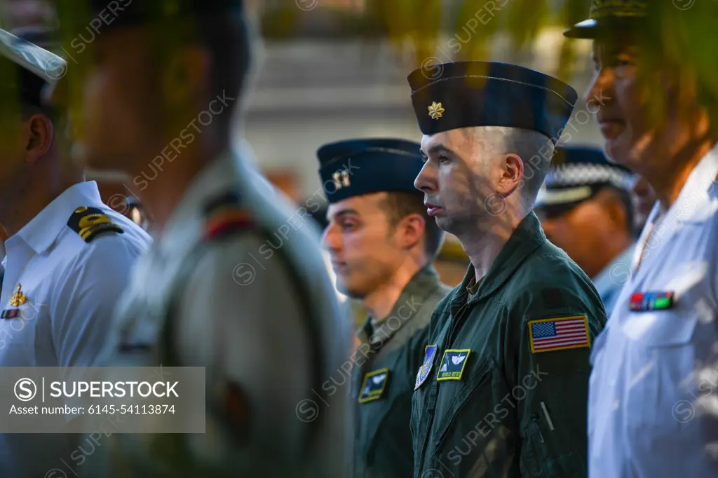 U.S. Air Force Maj Nicholas Reeves, 36th Airlift Squadron C130-J Pilot, stands in formation during a Victory in Europe Day World War II remembrance ceremony outside the Haut-commissariat de la République Tahiti, French Polynesia, May 8, 2022. The ceremony kicks off Marara 22, a multinational training exercise which enhances combined interoperability between the U.S. military and Frances Combined Joint Task Force Headquarters in French Polynesia.