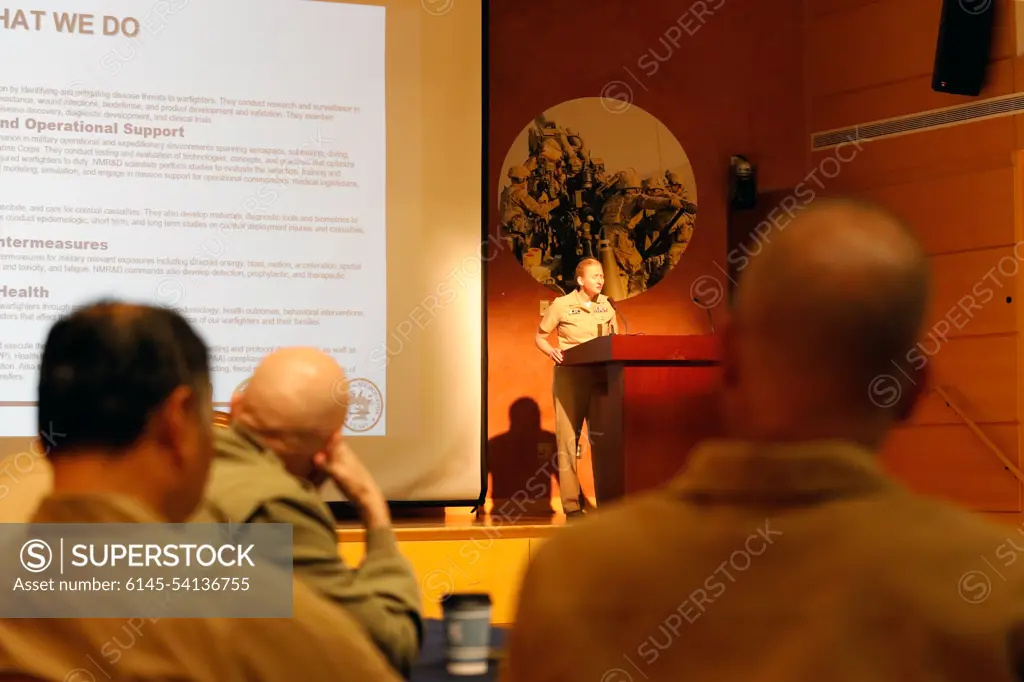 SILVER SPRING, Md. (June 8, 2022) Capt. Abigail Marter Yablonsky, deputy commander, Naval Medical Research Center (NMRC) speaks to members of the Fleet Health Integration Panel (FHIP) during a two-day meeting in support of the Fleet Commanders Readiness Council. Hosted by NMRC, The FHIP serves to act in concert to achieve standardized practices across Navy Medicine and present a unified view of Fleet Health Services to the line.