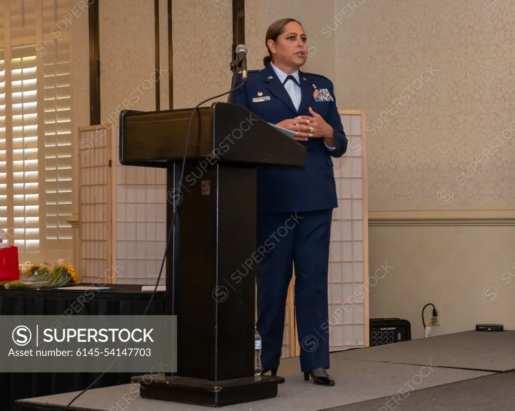 U.S. Air Force Col. Anadis Collado, 628th Medical Group commander, delivers a speech during the 628th MDG change of command ceremony at Joint Base Charleston, South Carolina, June 24, 2022. Collado has served in a myriad of roles within the medical service career field including at the clinical, hospital, and Numbered and Headquarters Air Force levels.