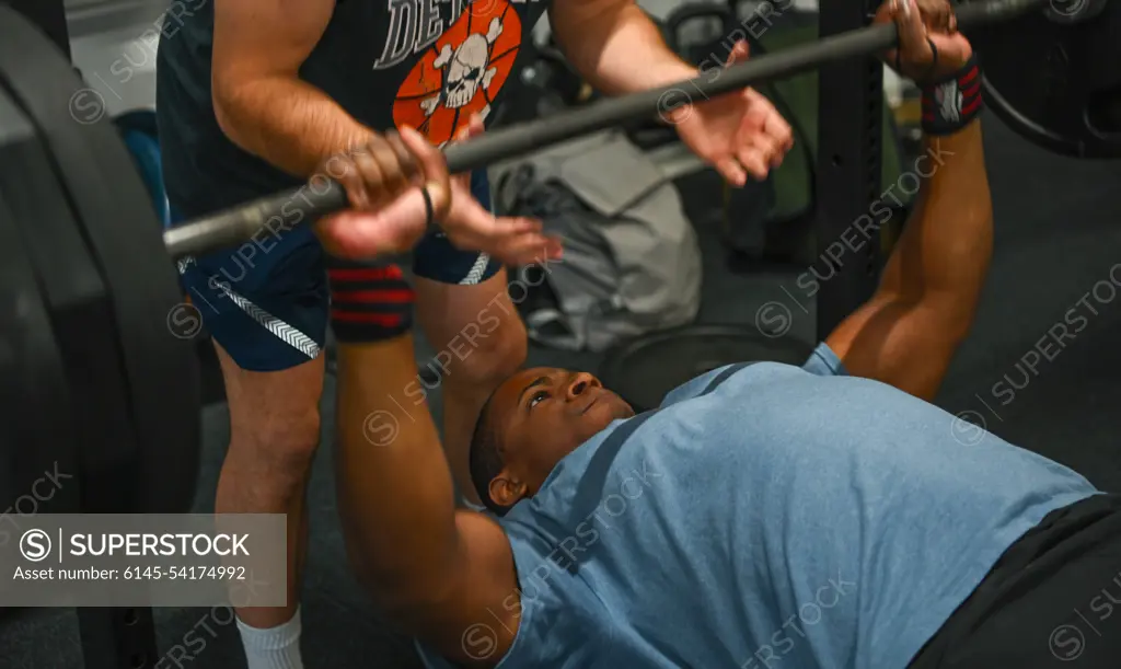 U.S. Air Force Senior Airman Stanley Brown, 703rd Munititons Support Squadron cyber transport technician stationed at Vokel Air Base, The Netherlands, competes in a powerlifting competition during the 2022 MUNSS Olympics at Buechel Air Base, Germany, August 5, 2022. The MUNSS Olympics is a two-day event that provides a way for the four geographically separated units across Europe to interact with each other through physical resilience and friendly competition.