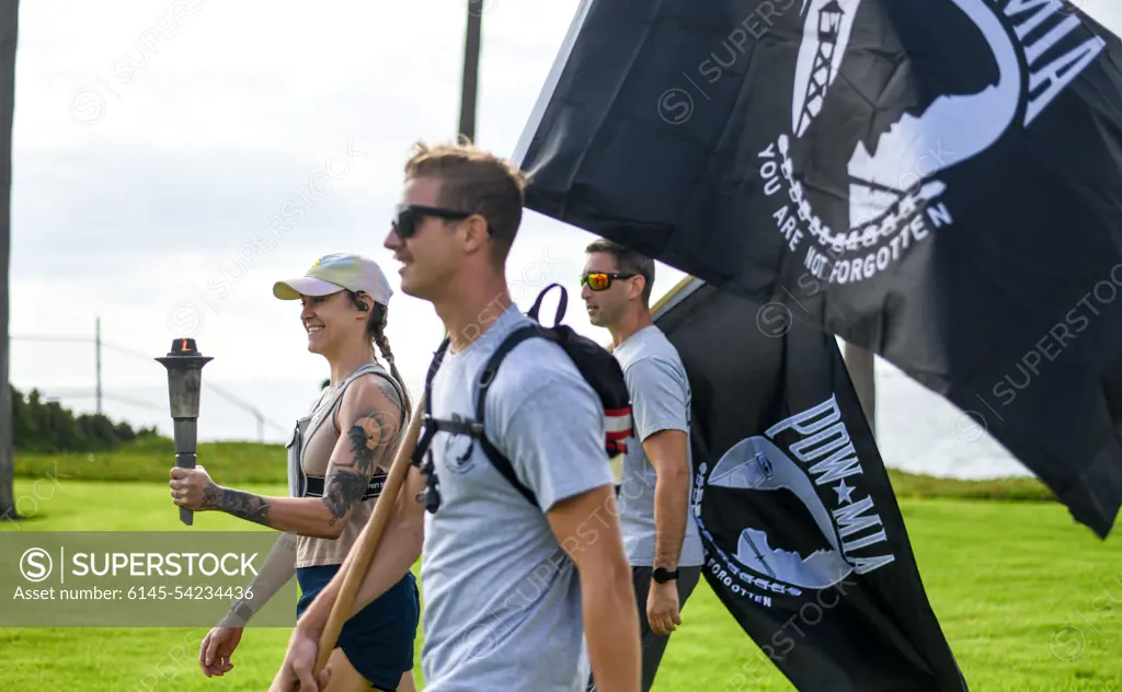 Los Angeles Air Force Base held a remembrance event for National POW/MIA Recognition Day that began on Sept. 15 and ended on Sept. 16 with a 54 mile torch run and wreath laying ceremony.  The torch lighting and run began at Terminal Island, California, and ended at the base. Various base and community organizations carried the torch while running relay legs. The Los Angeles Air Force Base honor guard presented the colors for the opening ceremony on Sept. 16, 2022. Col. Mia Walsh, Commander of Space Base Delta 3, hands the Most Miles Completed trophy to volunteers and the top runners.