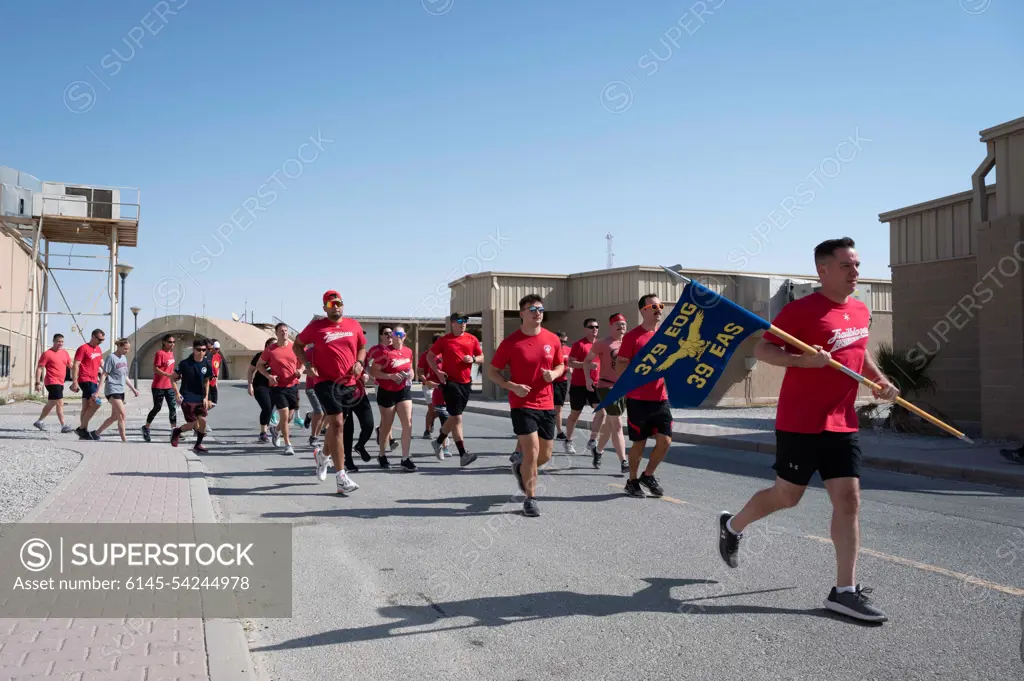 Airmen from the 39th Expeditionary Airlift Squadron run a symbolic .62 mile at Ali Al Salem Air Base, Kuwait, October 2, 2022, in remembrance for the six Airmen and five contractors who lost their lives, October 2, 2015, when a C-130J Super Hercules, call-sign TORQE 62, crashed on departure from Jalalabad Airfield, Afghanistan. The run concluded the days events following a remembrance ceremony for those who lost their lives that day.