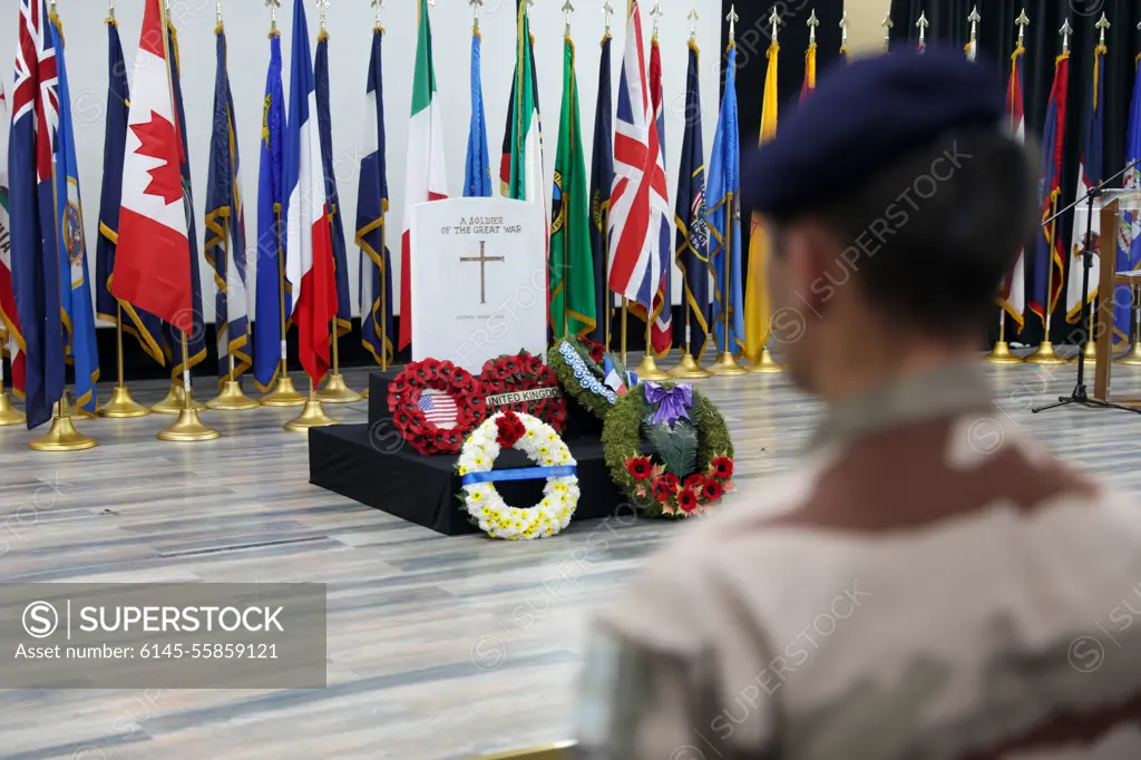 Members of ASG- Kuwait attend a Remembrance/Armistice/Veterans Day Ceremony at Camp Arifjan, Kuwait on Nov. 11, 2022. On the eleventh hour, of the eleventh day, on the eleventh month members of partner armed forces at Camp Arifjan came together to remember all of those who have served, currently serving, or gave the ultimate sacrificing while serving. As the anniversary of the end of the First World War, Nov. 11 is a day of remembrance for many nations around the world including Veteran's Day for the U.S.