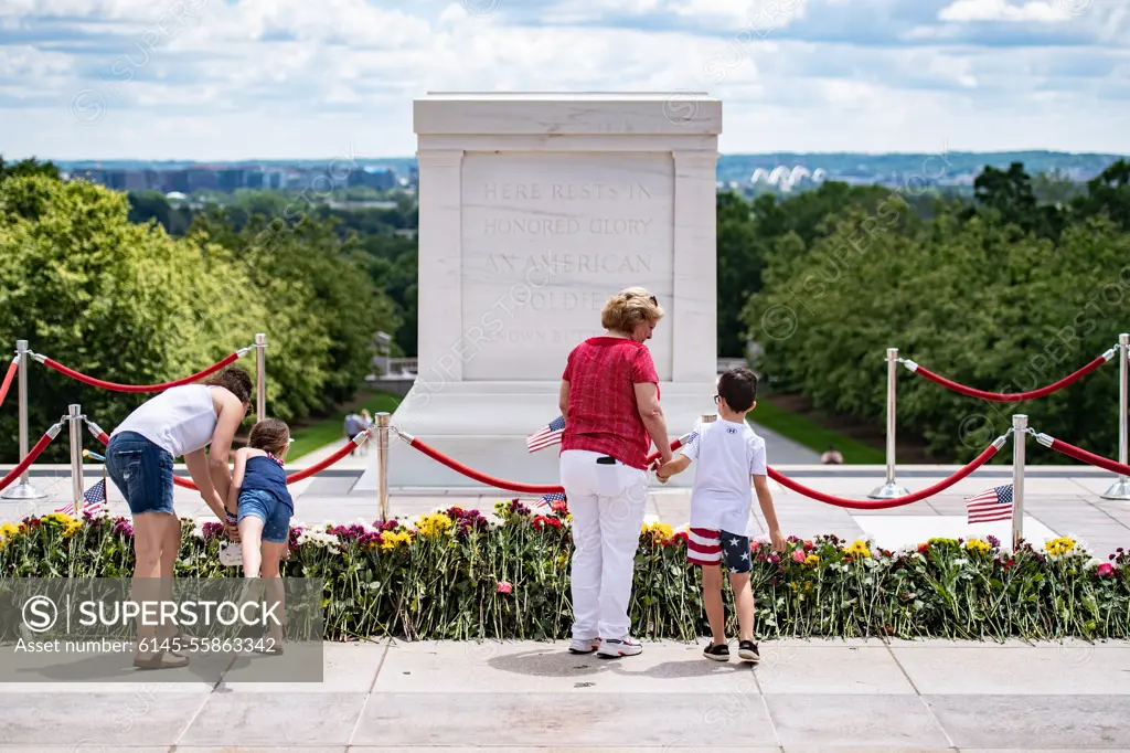 Visitors participate in the first Flowers of Remembrance Day at the Tomb of the Unknown Soldier at Arlington National Cemetery, Arlington, Va., May 28, 2022. Visitors were given the opportunity to cross the plaza and place a flower in front of the Tomb of the Unknown Soldier. This event pays homage to the first official Decoration Day, now known as Memorial Day, which originally took place at the cemetery in 1868 as a way to honor the sacrifices of those who fought and died in the Civil War.