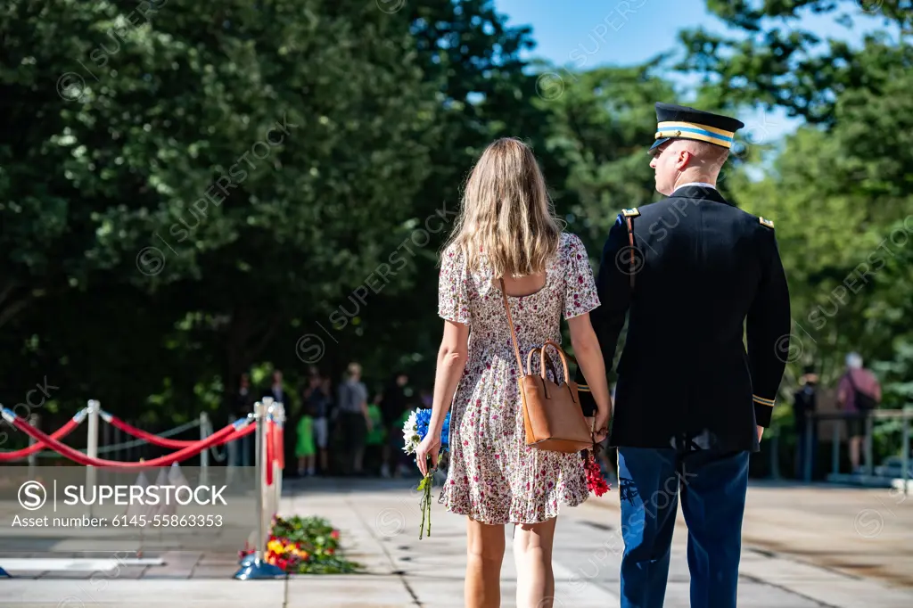 Visitors participate in the first Flowers of Remembrance Day at the Tomb of the Unknown Soldier at Arlington National Cemetery, Arlington, Va., May 28, 2022. Visitors were given the opportunity to cross the plaza and place a flower in front of the Tomb of the Unknown Soldier. This event pays homage to the first official Decoration Day, now known as Memorial Day, which originally took place at the cemetery in 1868 as a way to honor the sacrifices of those who fought and died in the Civil War.