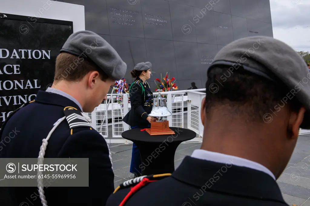 Day of Remembrance 2023. Members of the Viera High School JROTC Honor Guard observe a minute of silence during the Day of Remembrance ceremony at the Kennedy Space Center Visitor Complex in Florida on Jan. 26, 2023. The event honored the crews of Apollo 1 and space shuttles Challenger and Columbia, as well as other astronauts who lost their lives in the pursuit of spaceflight. This year marks the 20th anniversary of the Columbia tragedy. This years ceremony was hosted by the Astronauts Memorial Foundation, which was founded after the shuttle Challenger accident in 1986 to honor the sacrifices of fallen astronauts each year.