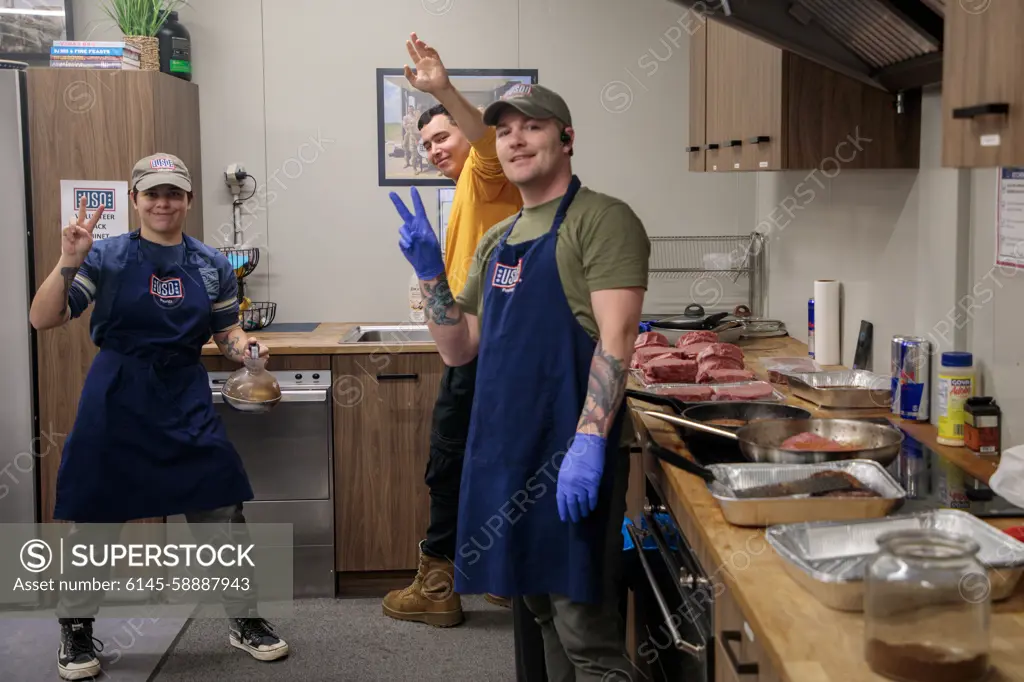 U.S. Army Sgt. Victoria Mirabile, Pfc. Douglas Thrower, and Staff Sgt. Daniel Price, all assigned to the 3rd Division Sustainment Brigades Task Force Provider, assist in the kitchen by cooking and cleaning during the Martin Luther King Jr. barbecue in Powdiz, Poland, on Jan. 15, 2024. Martin Luther King, Jr. Day, observed on the third Monday of January each year, marks the birthday of the civil rights leader and activist. In 1994, Congress designated Martin Luther King, Jr. Day as a national day of service. The theme of the day, A Day On, Not a Day Off, encourages individuals to dedicate the day to community service in remembrance of Dr. Kings remarkable legacy and to instill his principles of unity and equity throughout the world.