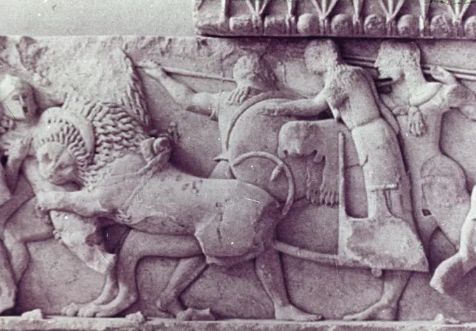 Poll photo collection. Greece. Detail of a Frisian with warriors in a car in a battle where a lion attacks someone .. January 1, 1930. Greece