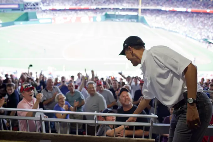 President Barack Obama greets baseball fans during a Washington Nationals vs. Chicago White Sox baseball game at Nationals Park in Washington, D.C., June 18, 2010.