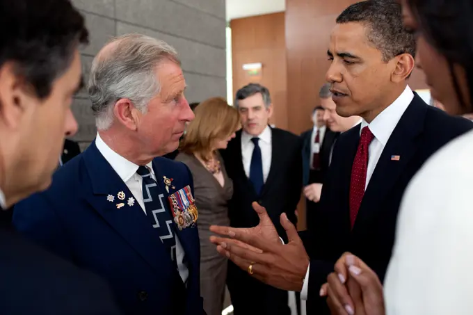 President Barack Obama speaks with Prince Charles following the President's speech at the memorial service at the Normandy American Cemetery in Colleville-sur-Mer, France, on the 65th anniversary of the D-Day landings, June 6, 2009.