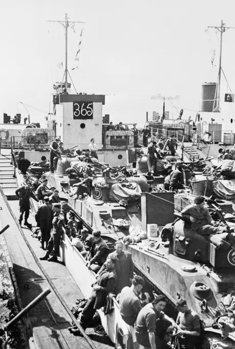 Preparations For Operation Overlord (the Normandy Landings)- D-day 6 June 1944 A British LCT (Landing Craft Tank) loaded with Sherman tanks, at a port on the south coast of England, during an exercise.