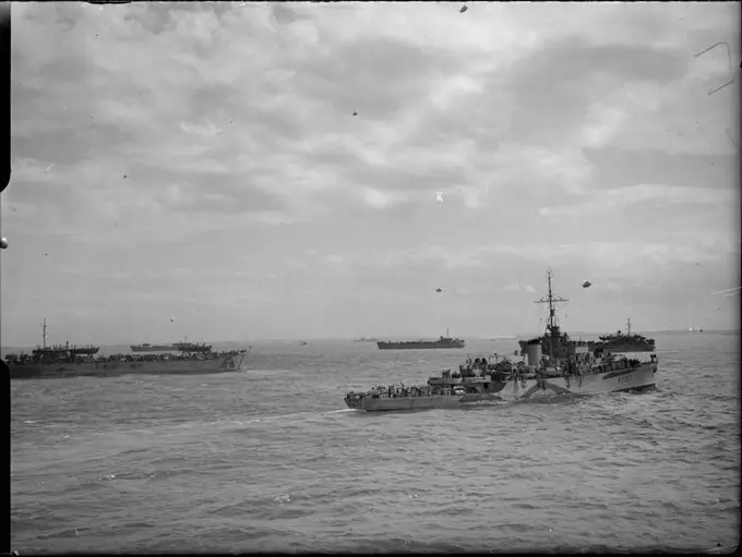 D-day - British Forces during the Invasion of Normandy 6 June 1944 The Free French River-Class frigate FFL LA SURPRISE K 292 (formerly HMS TORRIDGE) and LSTs (Landing Ship Tank) off Gold assault area, 6 June 1944.