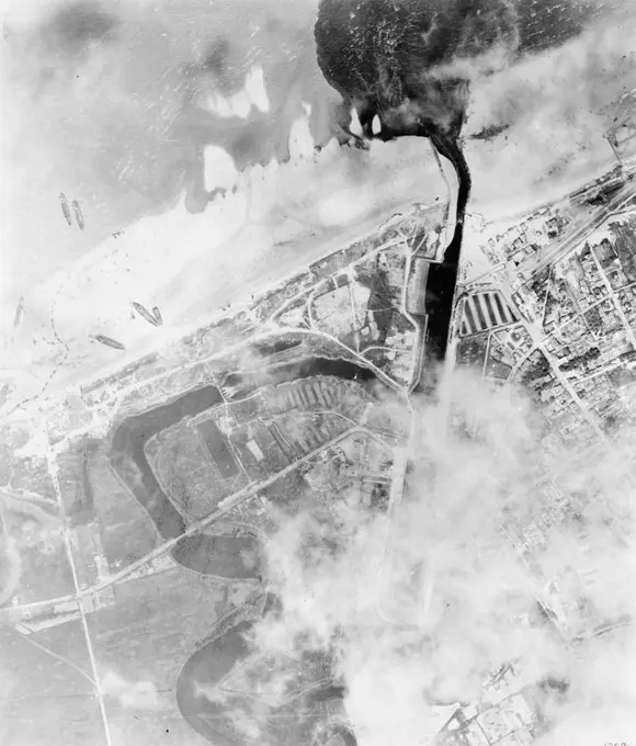 D-day - Allied Forces during the Invasion of Normandy 6 June 1944 Vertical aerial photograph of the landings on Mike beach, Juno area, at Courselles-sur-Mer, 6 June 1944.