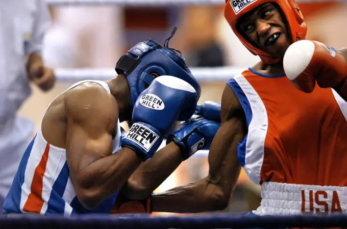 U.S. Army Spc. Hardwick Zacaeus, right, boxes Joan Nilusmas, from France, during the Counseil International du Sport Militarie's Military World Games in Hyderabad, India, Oct. 16, 2007. The games is the largest international, military, Olympic-style event in the world, with 103 countries and more than 5,000 athletes scheduled to compete.