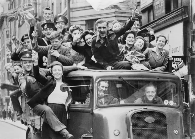 Ve Day Celebrations in London, 8 May 1945 A truck of revellers passing through the Strand, London