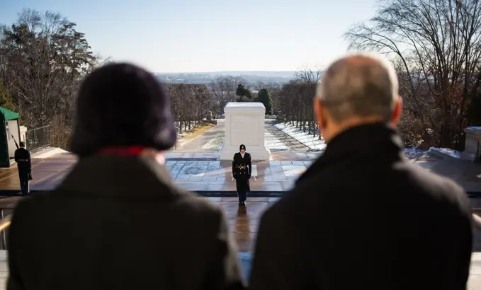 NASA Administrator Charles Bolden and his wife Alexis watch as Tomb guards with The Old Guard, the 3rd U.S. Infantry Regiment, perform a changing of the guard prior to a wreath-laying ceremony as part of NASA's Day of Remembrance, Wednesday, Jan. 28, 2015, at Arlington National Cemetery in Arlington, Va.  The wreaths were laid in memory of those men and women who lost their lives in the quest for space exploration.