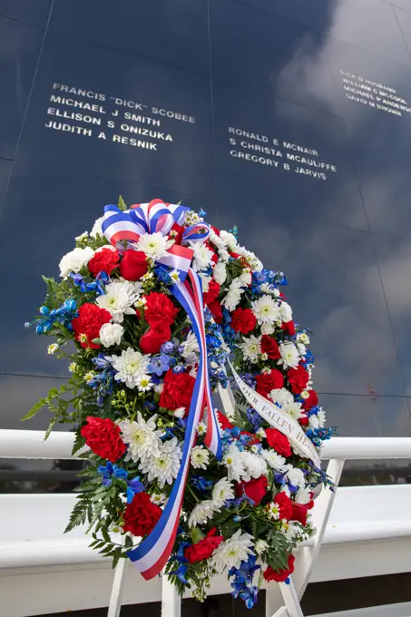 A wreath is displayed during the NASA Day of Remembrance ceremony at the Space Mirror Memorial in the Kennedy Space Center Visitor Complex on Jan. 30, 2020. The crews of Apollo 1 and space shuttles Challenger and Columbia, as well as other fallen astronauts who lost their lives in the name of space exploration and discovery, were honored at the annual event.