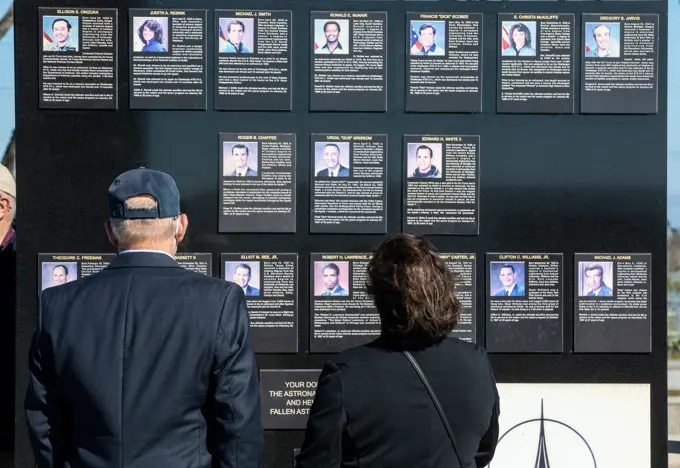 The crews of Apollo 1 and space shuttles Challenger and Columbia, as well as other fallen astronauts who lost their lives in the name of space exploration and discovery, are honored by NASA Kennedy Space Center employees and guests with a ceremony at the Kennedy Visitor Complexs Space Mirror Memorial on Jan. 28, 2021. The date marked the 35th anniversary of the Challenger tragedy. NASA centers throughout the country participate in the agencys annual Day of Remembrance memorial event.