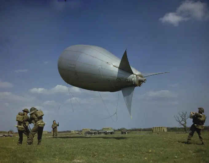 Royal Air Force Balloon Crew in Britain, 1944 Royal Air Force Combined Operations balloon crew hauling in a small barrage balloon of the type used during the D-Day landings.