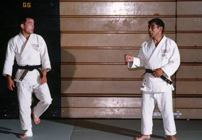 Army 2nd Lieutenant Craig Agena from Fort Carson, Colorado, and another member of the judo team, prepare for competition at the 1984 Summer Olympics. Base: Los Angeles State: California (CA) Country: United States Of America (USA)