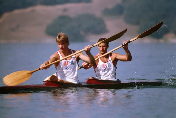 Army National Guard Private First Class Daniel W. Schnurrenberger, right, from Newport Beach, California, participates in the kayak competition at the 1984 Summer Olympics. Base: Lake Casitas State: California (CA) Country: United States Of America (USA)