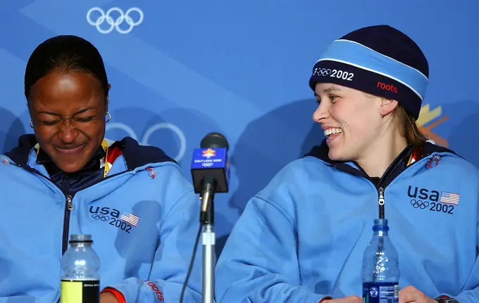 Vonetta Flowers (left) and World Class Athlete SPECIALIST Jill Bakken, USA, laugh at the recent accomplishment moments after winning the gold medal for the United States in first women's two-man bobsled event during the 2002 WINTER OLYMPIC GAMES. The team was not favored going in but ended up breaking a 46 year drought for the United States and winning the Gold over another American team and favored German team, setting a track record in the process. Subject Operation/Series: 2002 WINTER OLYMPIC GAMES Base: Park City State: Utah (UT) Country: United States Of America (USA)