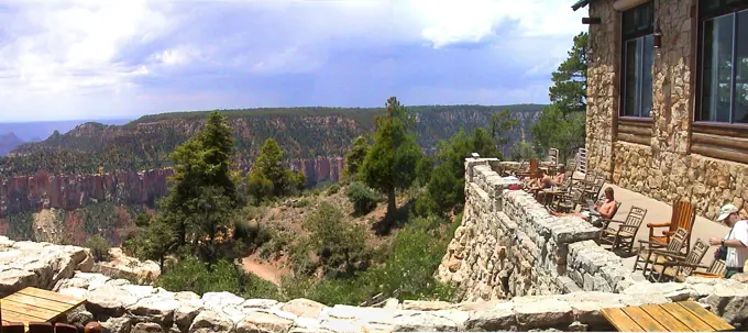 Kaibab Plateau-North Rim Parkway - Enjoy Nature's Beauty on the Grand Canyon. Sun seekers relax and gaze at the Grand Canyon from the Grand Canyon Lodge. Arizona (36.198° N 112.052° W)