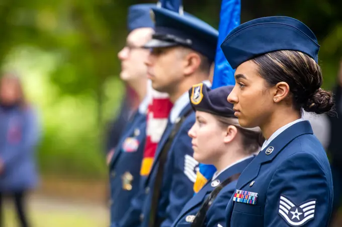 Airmen from the 422d Air Base Group honor guard stand at attention during a Remembrance Day ceremony at RAF Welford, England, Nov. 10, 2022. Airmen from the 501st Combat Support Wing, Royal Air Force, and distinguished guests came together to honor the sacrifices of armed forces veterans, past and present.