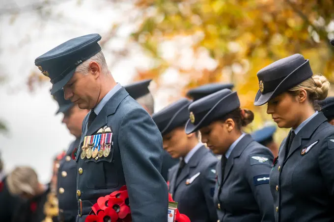 Members of the Royal Air Force bow their heads during a Remembrance Day ceremony at RAF Welford, England, Nov. 10, 2022. Airmen from the 501st Combat Support Wing, RAF, and distinguished guests came together to honor the sacrifices of armed forces veterans, past and present.