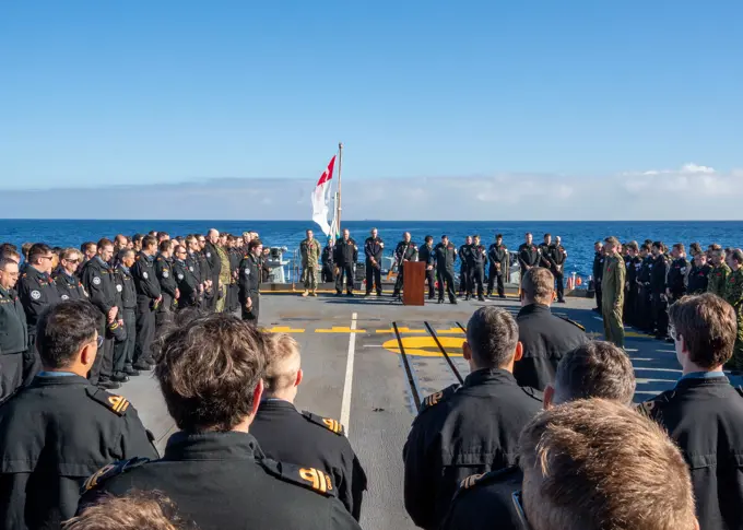 ATLANTIC OCEAN (Nov. 11, 2022) Canadian Rear Adm. David Patchell, vice commander, U.S. 2nd Fleet, attends a Canadian Remembrance Day ceremony on the Halifax-class frigate HMCS Montreal (FFH 336), Nov. 11.  The Montreal is attached to the Gerald R. Ford Carrier Strike Group which is deployed in the Atlantic Ocean, conducting training and operations alongside NATO Allies and partners to enhance integration for future operations and demonstrate the U.S. Navy's commitment to a peaceful, stable and conflict-free Atlantic region.