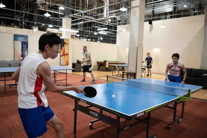 Participants from Team Misawa play table tennis  during the first-ever Sakura Olympics at Misawa Air Base, Japan, April 22, 2022. The Sakura Olympics, which took over seven months to plan, culminated in a month-long event in which U.S. forces and Japan Air Self-Defense Force members competed in over 10 sporting events.