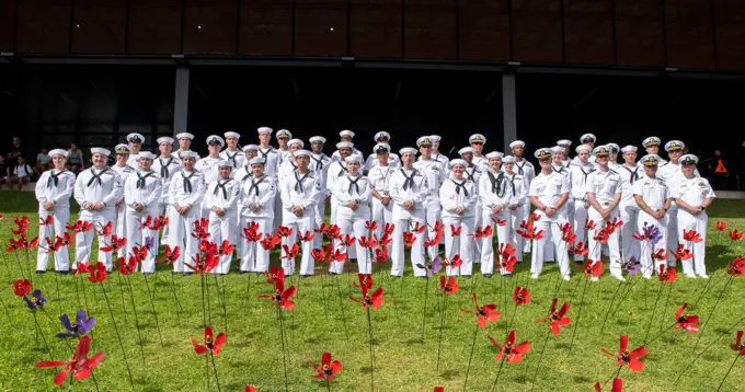 FREMANTLE, Australia (April 25, 2022) - Sailors assigned to the Emory S. Land-class submarine tender USS Frank Cable (AS 40) pose for a group photo following the Anzac Day parade held in Fremantle, Australia, April 25, 2022. Anzac Day is a day of remembrance for all Australian and New Zealand service members who gave the ultimate sacrifice in service to their country. Frank Cable is currently on patrol conducting expeditionary maintenance and logistics in support of national security in the U.S. 7th Fleet area of operations.