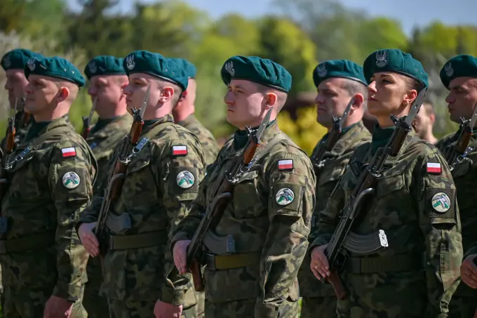 Polish soldiers stand in formation during a Victory Day remembrance ceremony at Drawsko Pomorskie, Poland, May 8, 2022. Victory Day, or V - E Day in the United States, recognizes the end of World War II in the European theater, and remembers the sacrifices of service members and civilians lost during the conflict.