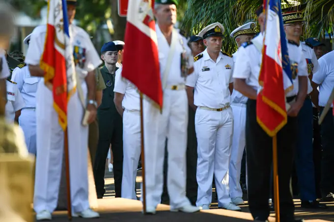 Participants stand at-ease during a Victory in Europe Day World War II remembrance ceremony outside the Haut-commissariat de la République Tahiti, French Polynesia, May 8, 2022. Exercise Marara 22 reinforces U.S. commitments to our allies and partners in Oceania and raises our collective readiness to address crises and contingencies in the region.