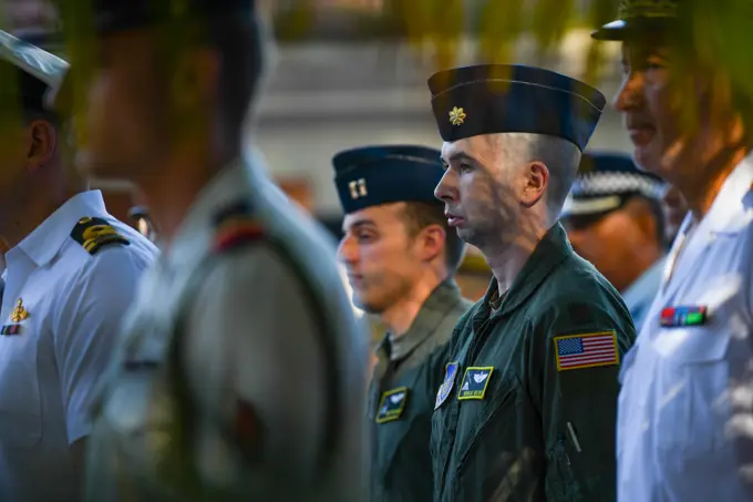 U.S. Air Force Maj Nicholas Reeves, 36th Airlift Squadron C130-J Pilot, stands in formation during a Victory in Europe Day World War II remembrance ceremony outside the Haut-commissariat de la République Tahiti, French Polynesia, May 8, 2022. The ceremony kicks off Marara 22, a multinational training exercise which enhances combined interoperability between the U.S. military and Frances Combined Joint Task Force Headquarters in French Polynesia.