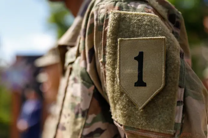 A U.S. Soldier assigned to the 1st infantry Division stands at attention during a Memorial Day ceremony at Poznan, Poland, May 30, 2022. Memorial Day is a day of remembrance, dedicated to all those who gave their lives in service of the U.S.