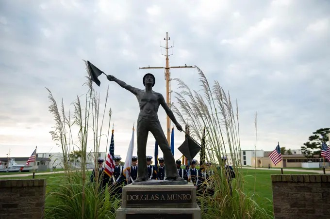 CAPE MAY, N.J. - Personnel at U.S. Coast Guard Training Center Cape May hold a remembrance ceremony for Petty Officer 1st Class Douglas Munro at his statue on the parade field, Sept. 27, 2022.U.S. Coast Guard men and women carry out a wide variety of diverse missions every day. Protecting people and commerce on the sea, protecting the sea itself, and protecting the country from threats aboard. We focus on present-day operations and readiness and strive to be prepared for tomorrow, but certain times compel us, and all Americans, to reflect on our history and heritage. The 80th anniversary of Munros extraordinarily heroic actions at Guadalcanal is such a day.