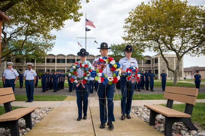 CAPE MAY, N.J. - Personnel at U.S. Coast Guard Training Center Cape May hold a remembrance ceremony for Petty Officer 1st Class Douglas Munro at his statue on the parade field, Sept. 27, 2022.U.S. Coast Guard men and women carry out a wide variety of diverse missions every day. Protecting people and commerce on the sea, protecting the sea itself, and protecting the country from threats aboard. We focus on present-day operations and readiness and strive to be prepared for tomorrow, but certain times compel us, and all Americans, to reflect on our history and heritage. The 80th anniversary of Munros extraordinarily heroic actions at Guadalcanal is such a day.