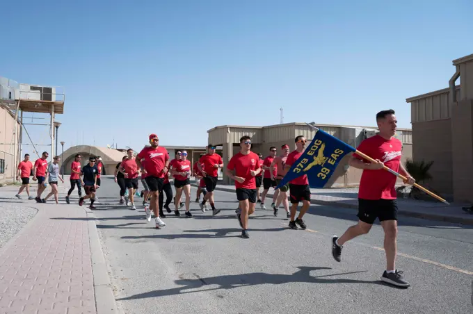 Airmen from the 39th Expeditionary Airlift Squadron run a symbolic .62 mile at Ali Al Salem Air Base, Kuwait, October 2, 2022, in remembrance for the six Airmen and five contractors who lost their lives, October 2, 2015, when a C-130J Super Hercules, call-sign TORQE 62, crashed on departure from Jalalabad Airfield, Afghanistan. The run concluded the days events following a remembrance ceremony for those who lost their lives that day.