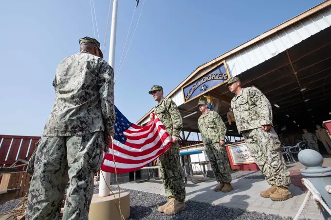 CAMP LEMONNIER, Djibouti (Sept. 11, 2022) During a ceremony this morning at Camp Lemonnier, Djibouti (CLDJ) the United States Flag was lowered to half-staff in order remember the 2,977 victims of the terrorist attacks on our nation that occurred on 11 September 2001.  Camp Lemonnier's leadership and Chief's Mess wanted to take the opportunity to reflect on the victims of this attack as well as those who served and gave the ultimate sacrifice supporting the Global War on Terrorism. As Americans, we chose to commemorate this day with act of service and remembrance. CLDJ serves as an expeditionary base for U.S. military forces providing support to ships, aircraft and personnel that ensure security throughout Europe, Africa and Southwest Asia.