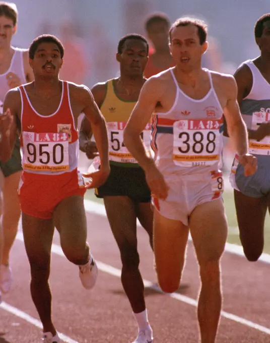 AIRMAN 1ST Class Owen Hamilton, center, from Wright-Patterson Air Force Base, Ohio, represents Jamaica in the 800 meter track and field team event at the 1984 Summer Olympics. Base: Los Angeles State: California (CA) Country: United States Of America (USA)