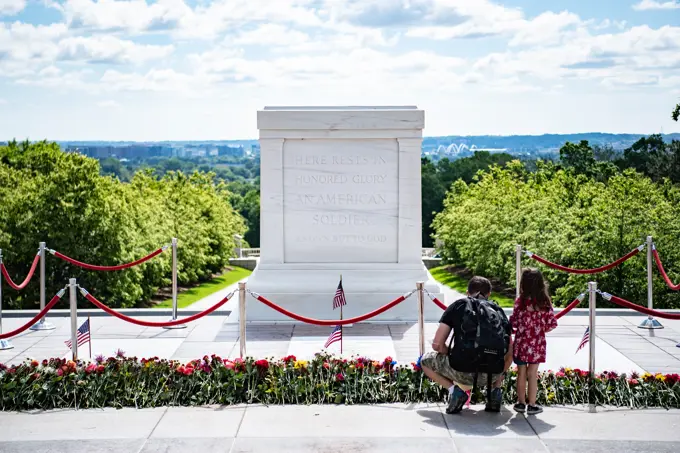 Visitors participate in the first Flowers of Remembrance Day at the Tomb of the Unknown Soldier at Arlington National Cemetery, Arlington, Va., May 28, 2022. Visitors were given the opportunity to cross the plaza and place a flower in front of the Tomb of the Unknown Soldier. This event pays homage to the first official Decoration Day, now known as Memorial Day, which originally took place at the cemetery in 1868 as a way to honor the sacrifices of those who fought and died in the Civil War.