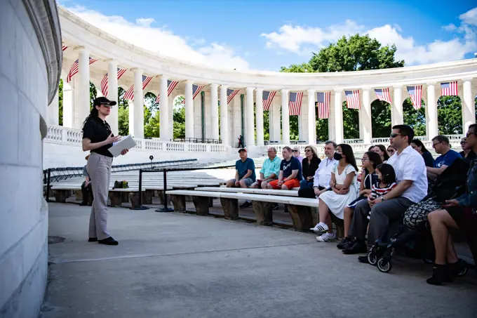 Dr. Allison Finkelstein, senior historian, Arlington National Cemetery, gives a history lecture to visitors in the Memorial Amphitheater during the first Flowers of Remembrance Day at Arlington National Cemetery, Arlington, Va., May 28, 2022. Visitors were given the opportunity to cross the plaza and place a flower in front of the Tomb of the Unknown Soldier. This event pays homage to the first official Decoration Day, now known as Memorial Day, which originally took place at the cemetery in 1868 as a way to honor the sacrifices of those who fought and died in the Civil War.