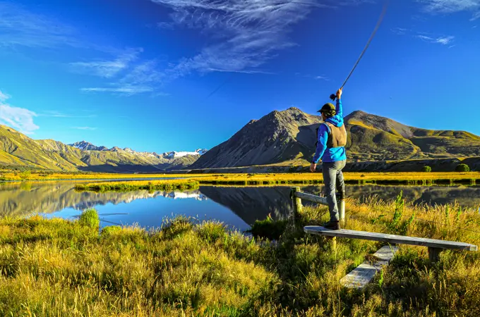 Fly Fishing in New Zealand on the Ahuriri River South Island.