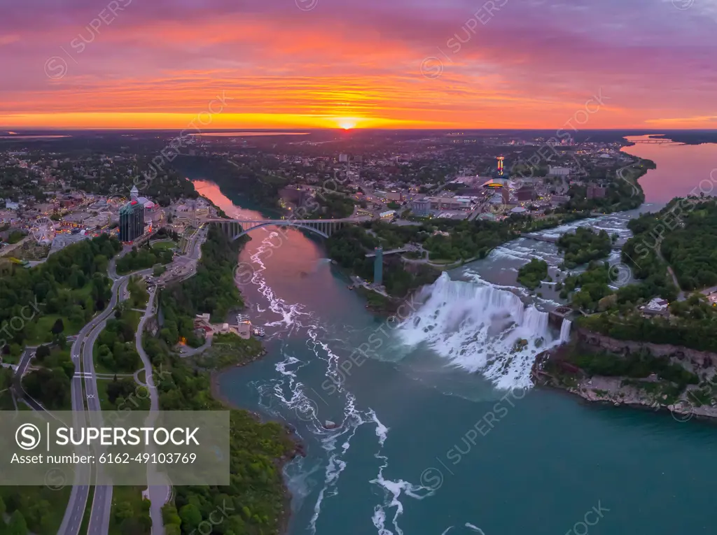 Aerial view of Niagara Falls, Canada-USA during scenic sunset.