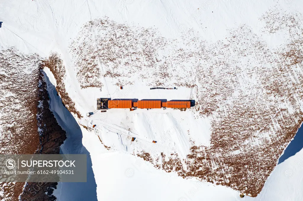 Aerial view of SANAE IV base surrounded by snow in Antarctica