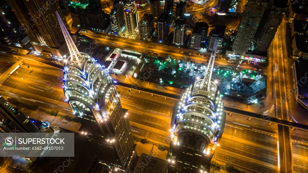 Aerial view of illuminated skyscrapers in Dubai at night, U.A.E.