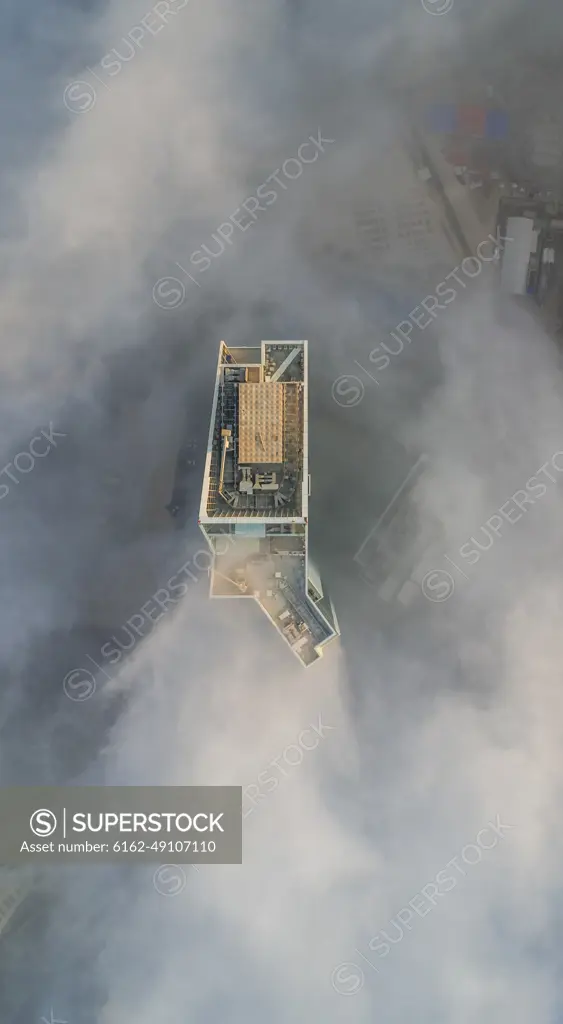 Aerial view of skyscrapers in the clouds of Dubai, U.A.E