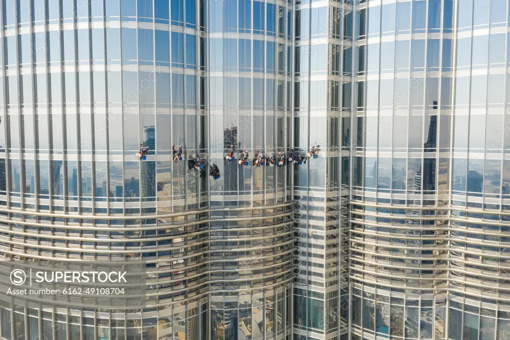 Aerial view of men working in the Burj Khalifa building, Dubai, United Arab Emirates