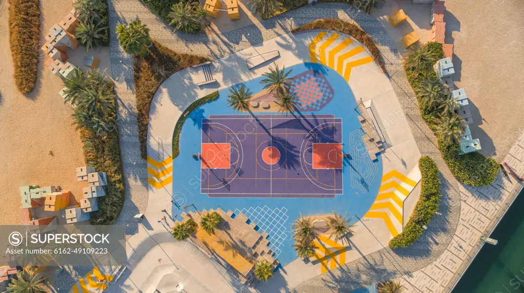 Aerial view of a Basketball playground at the Skate Park the Block along Dubai Creek, Dubai, United Arab Emirates.